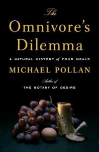 Book cover of The Omnivore’s Dilemma by Michael Pollan