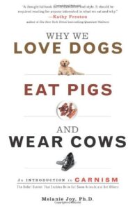 Book cover of Why We Love Dogs, Eat Pigs, and Wear Cows by Melanie Joy